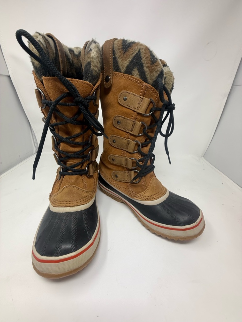 Sorel Brown and Black Lace-Up Winter Boots with Patterned Lining